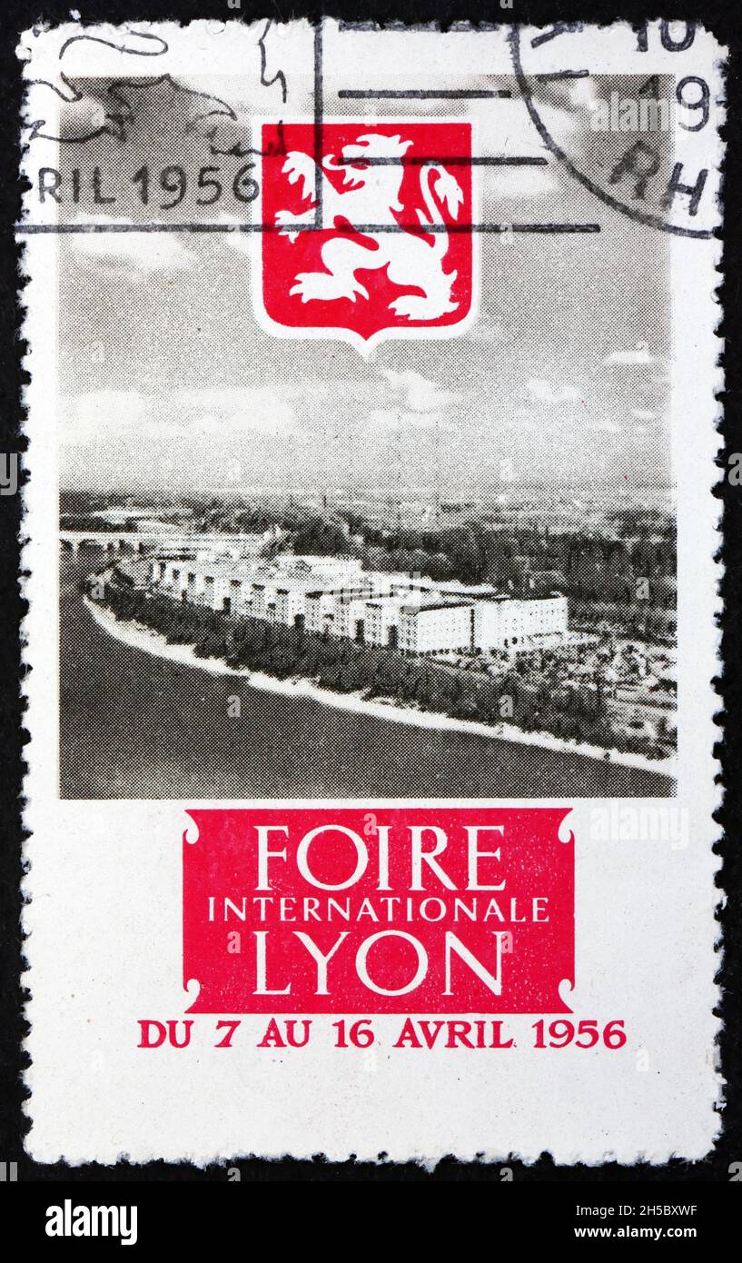 FRANCIA - CIRCA 1956: Un francobollo stampato in Francia mostra Lione fiera 1956, bollo poster vignetta, circa 1956 Foto Stock