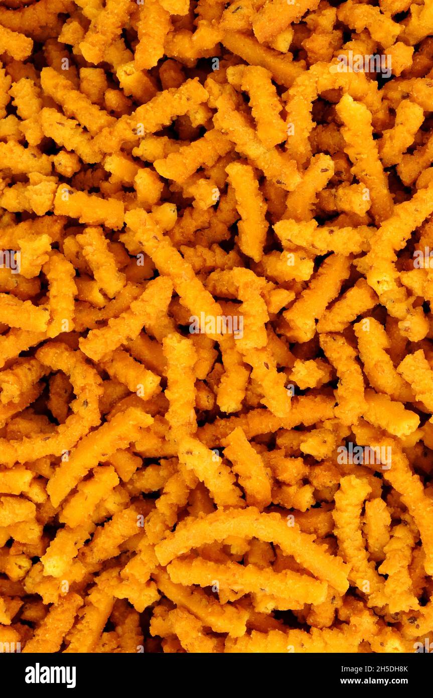 Chakri indiano saporito piccante riso croccante fondo snack bastone Foto Stock
