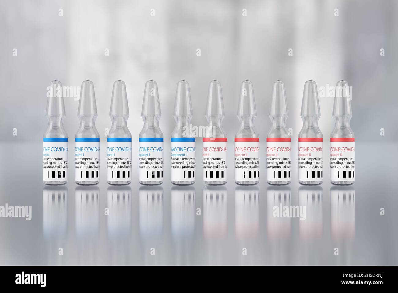 Lotto di vaccino a due componenti contro l'infezione da coronavirus COVID-19 (SARS-COV-2). Dieci fiale di due componenti di colore blu e rosso con una dosa Foto Stock