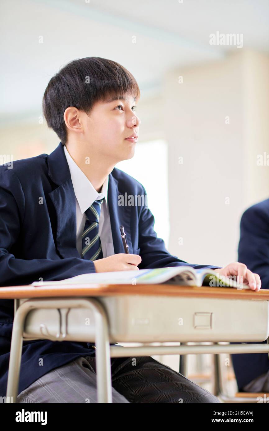 Studente giapponese in classe Foto Stock