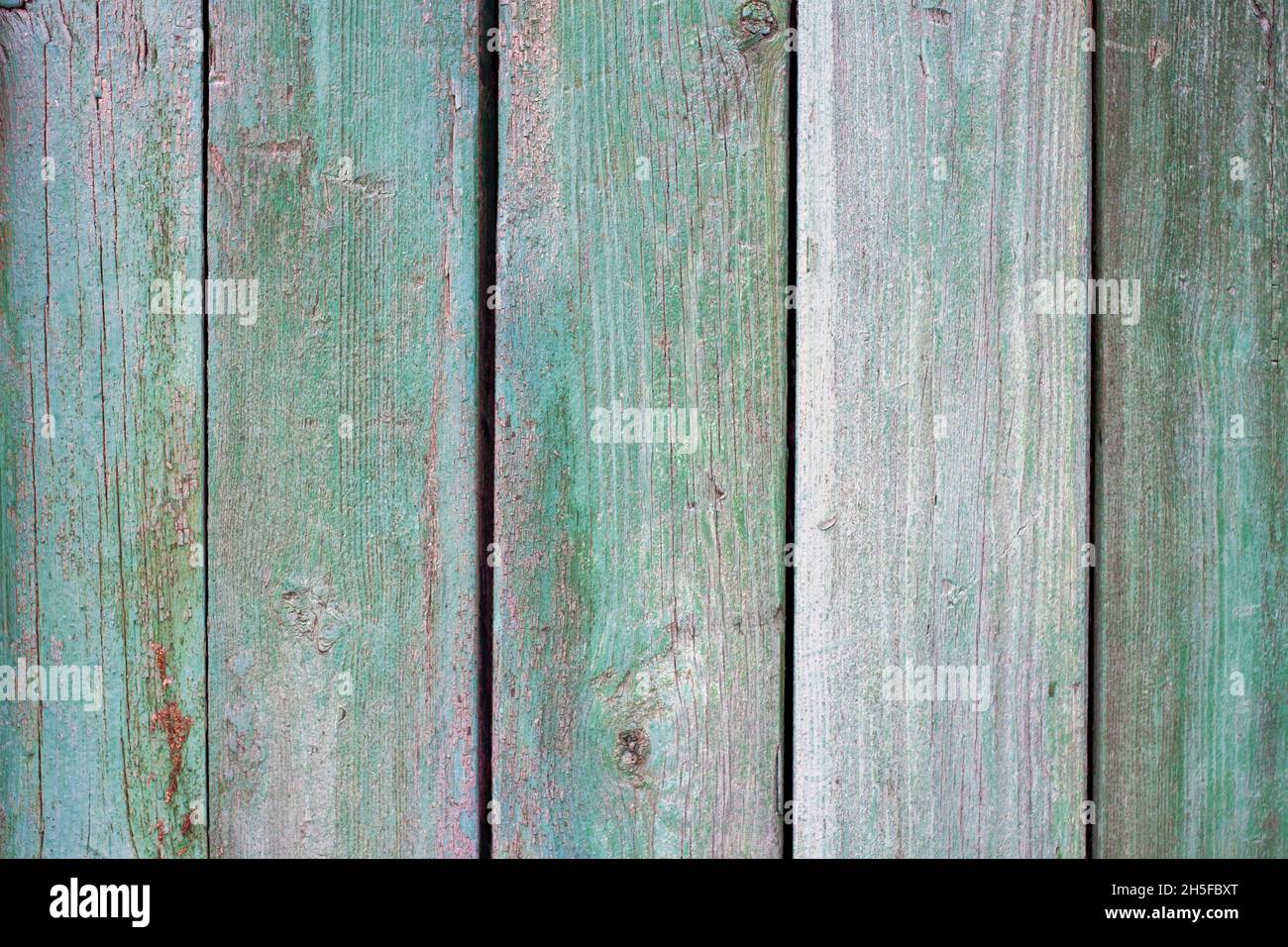 Vecchio sfondo di legno con vernice incrinata Foto Stock