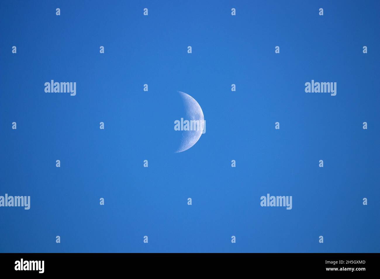 Fase lunare a metà pomeriggio Foto Stock