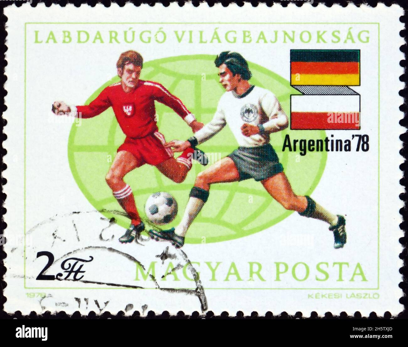 UNGHERIA - CIRCA 1978: Un francobollo stampato in Ungheria mostra i giocatori di calcio, bandiere della Germania occidentale e della Polonia, Argentina 78, 11th World Cup Soccer Champions Foto Stock