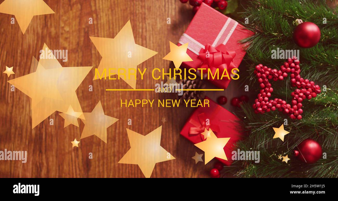 Immagine di buon testo di natale sopra i regali Foto Stock