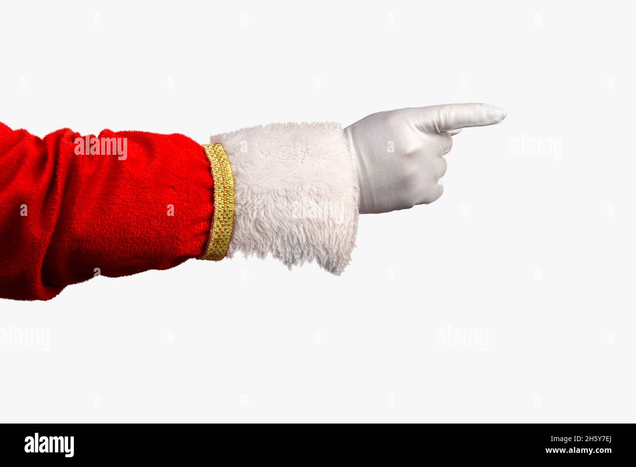Foto di Babbo Natale guanto la mano nel gesto di puntamento. Babbo Natale puntando le dita su rosso. Mano e braccio solo in formato orizzontale. L'immagine può essere Foto Stock