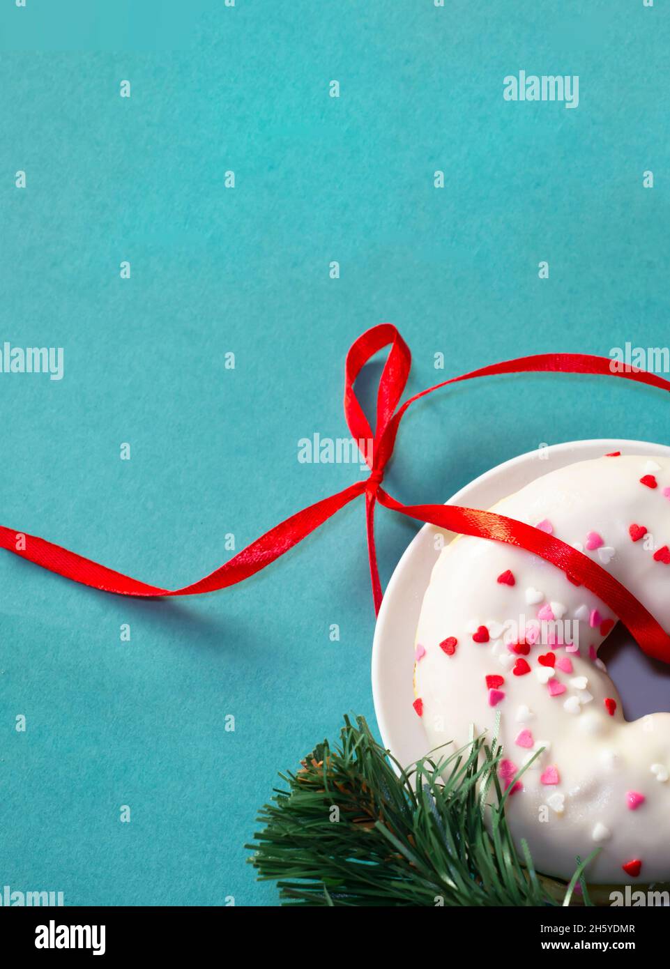Angolo di Natale con ciambella. Spazio di copia per il testo. Foto Stock