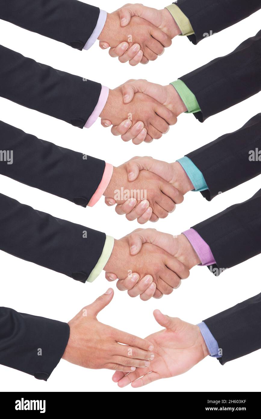 Handshake umani in tute aziendali formali. Foto Stock