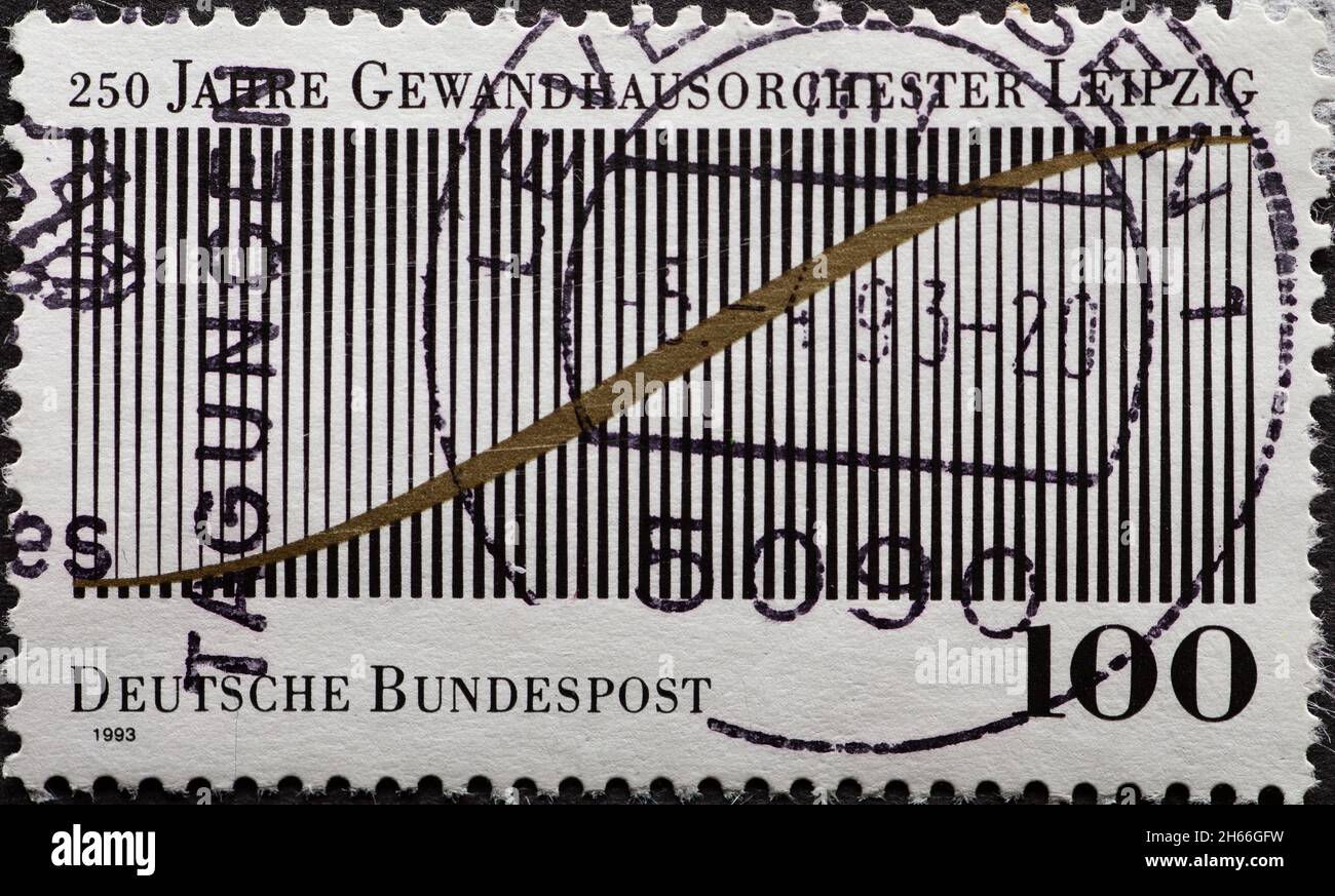 GERMANIA - CIRCA 1993: Un francobollo dalla Germania, che mostra una rappresentazione grafica di un'oscillazione sonora stilizzata. 250 anni di Leipzig Gewandh Foto Stock
