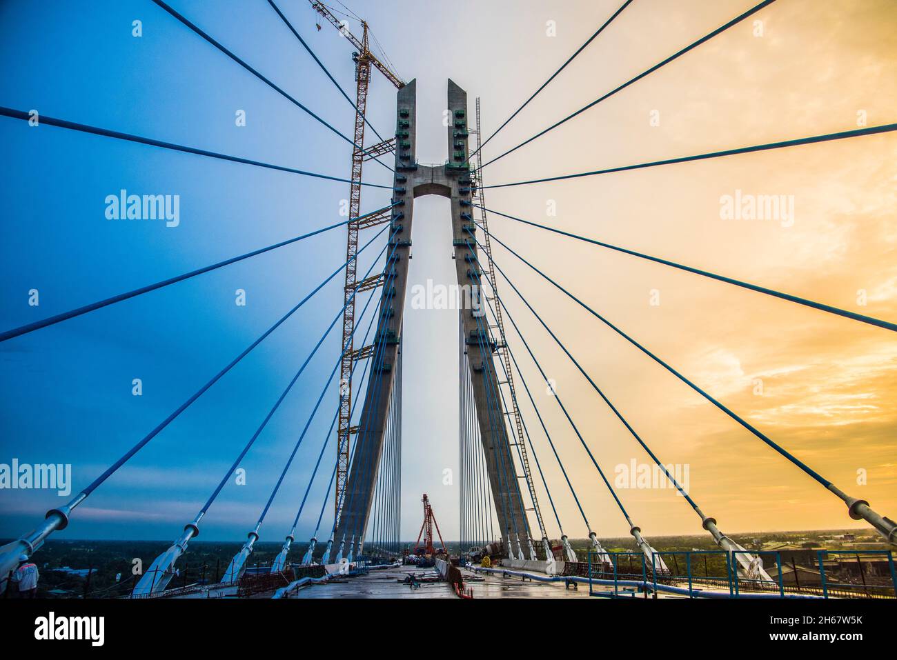 Tramonto al ponte VAM Cong sul fiume Mekong Foto Stock