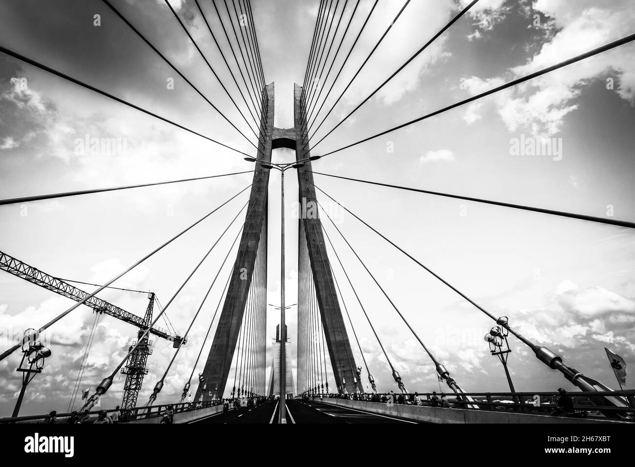 Tramonto al ponte VAM Cong sul fiume Mekong Foto Stock