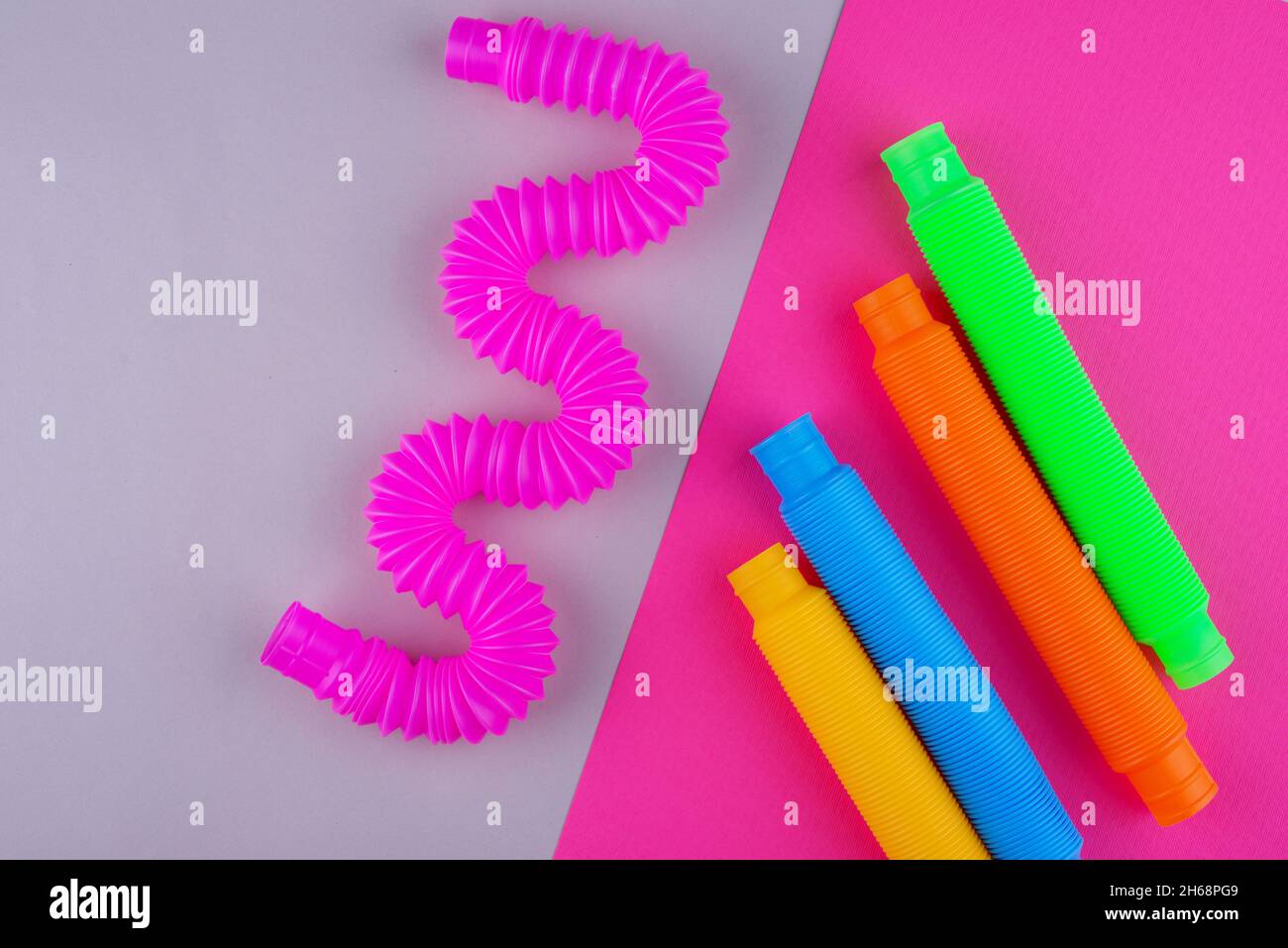 Diverse provette pop. Giocattolo antistress alla moda Foto Stock