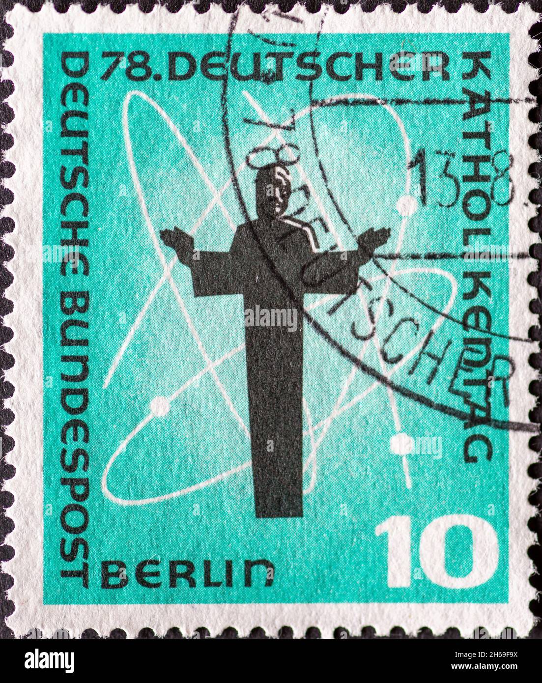 GERMANIA - CIRCA 1958: Un francobollo dalla Germania, Berlino che mostra una rappresentazione di Cristo, simbolo del cosmo. 78° giorno cattolico tedesco a Berlino Foto Stock