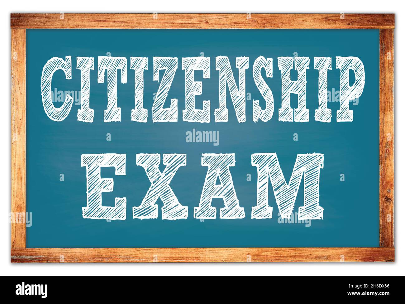 CITIZENSHIP EXAM written on blue wooden frame school blackboard Foto Stock