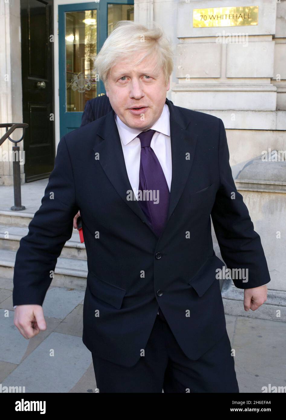 Il sindaco di Londra Boris Johnson lascia stasera un incontro di emergenza della COBRA a Londra, dopo la decapitazione di un soldato britannico a Woolwich questo pomeriggio. Foto Stock