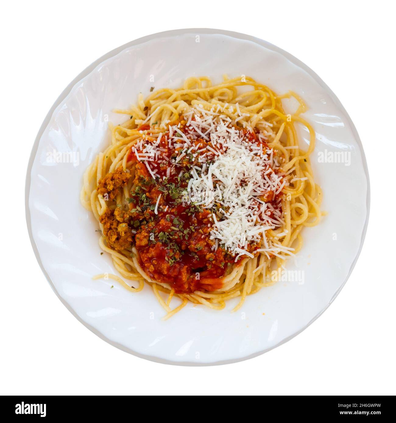 Spaghetti bolognese con parmigiano grattugiato ed erbe aromatiche essiccate Foto Stock