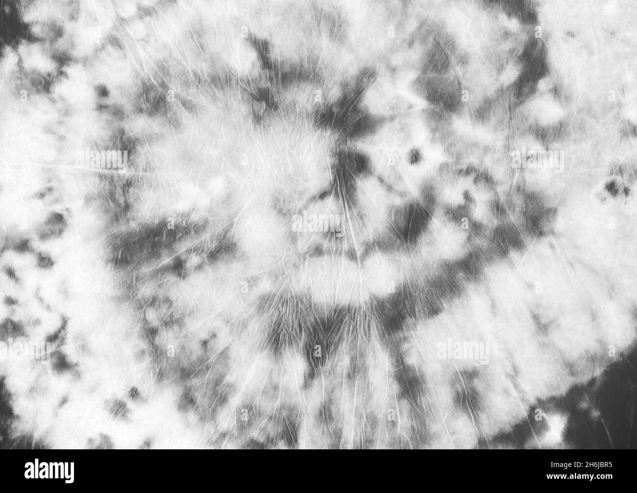 Tessuto tie-dye. Maglia artistica grigia. Astratto Foto Stock