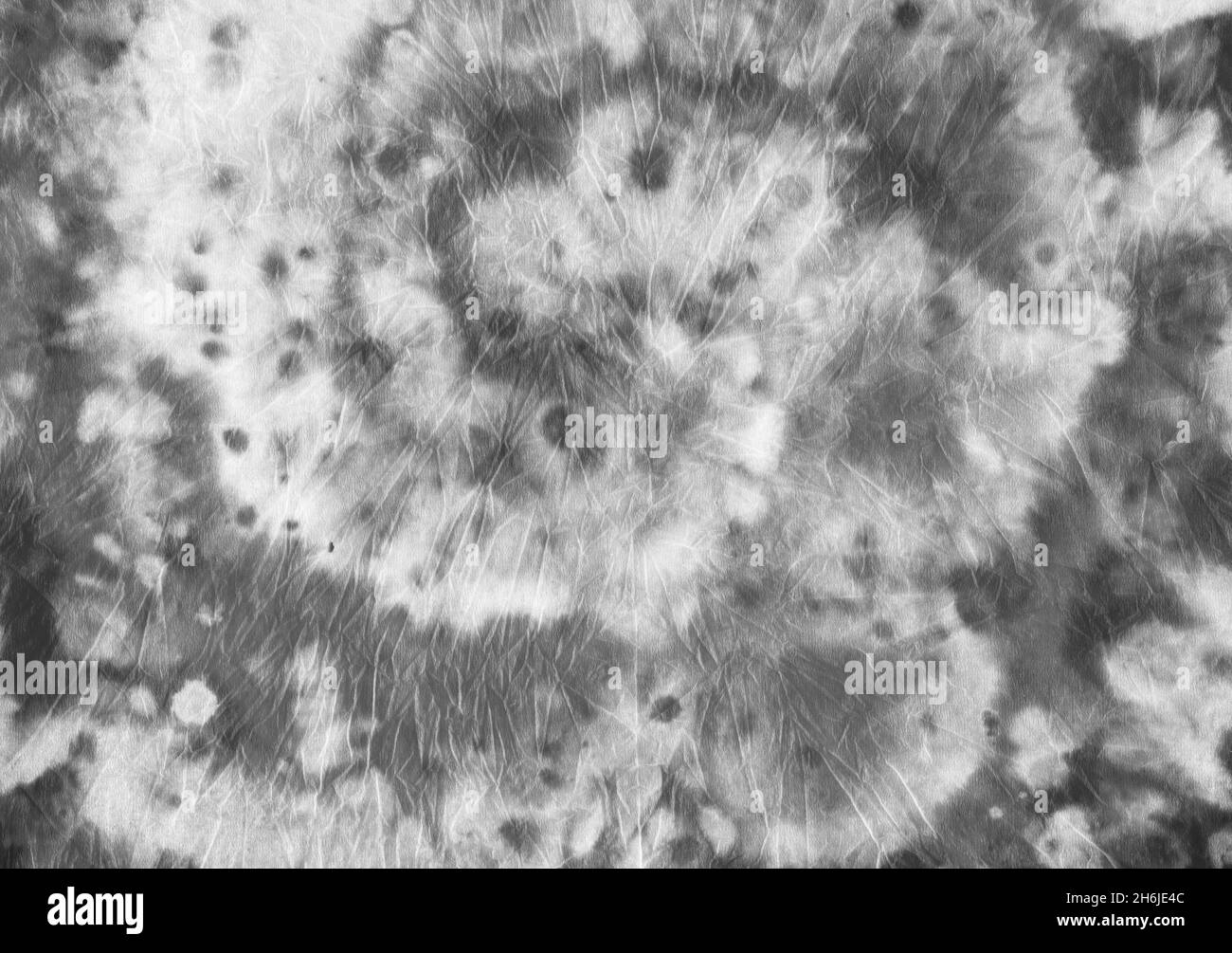 Tessuto tie-dye. Stampa artistica in nero. Hippie Foto Stock