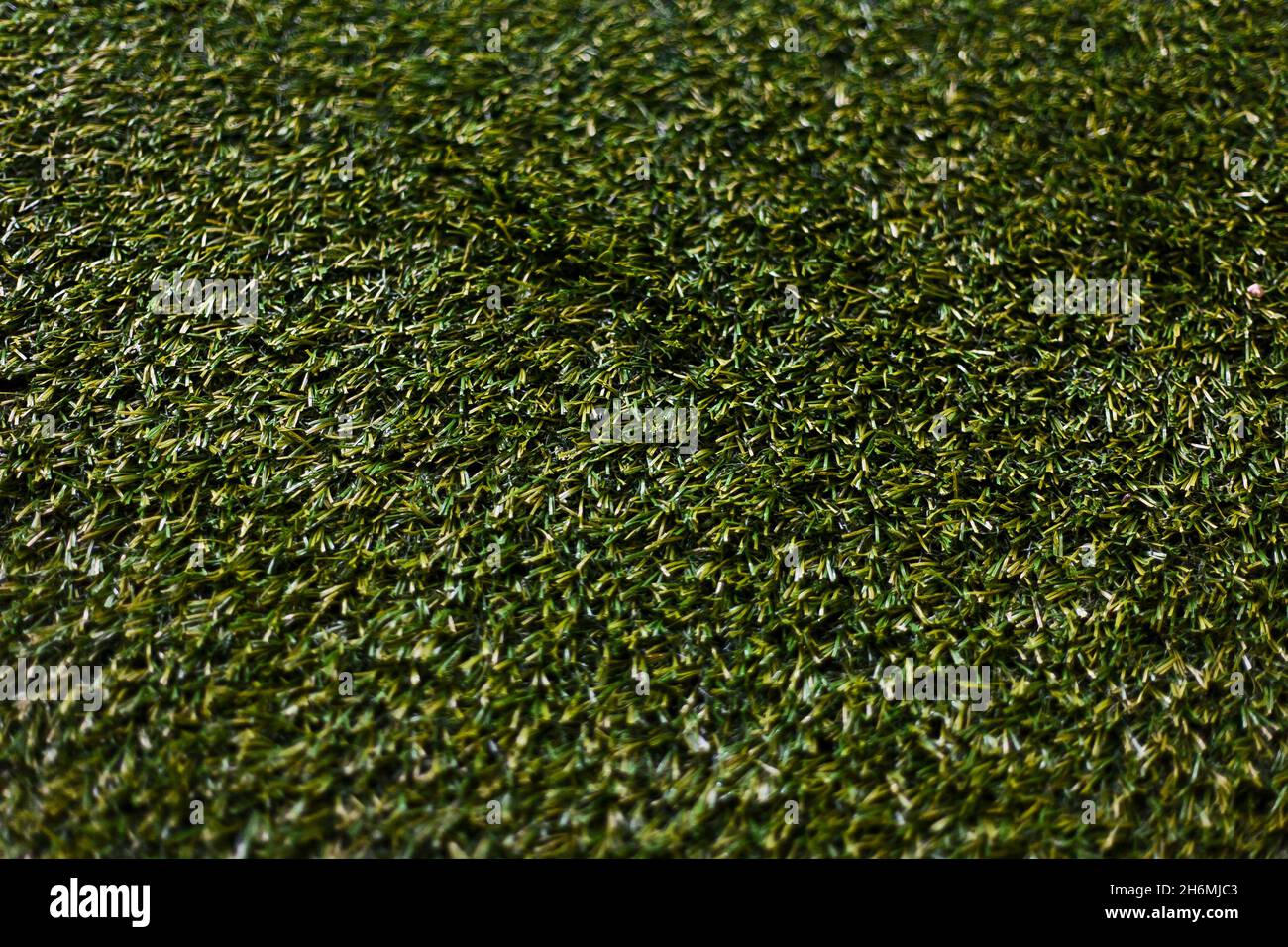 Erba verde sintetica Foto Stock
