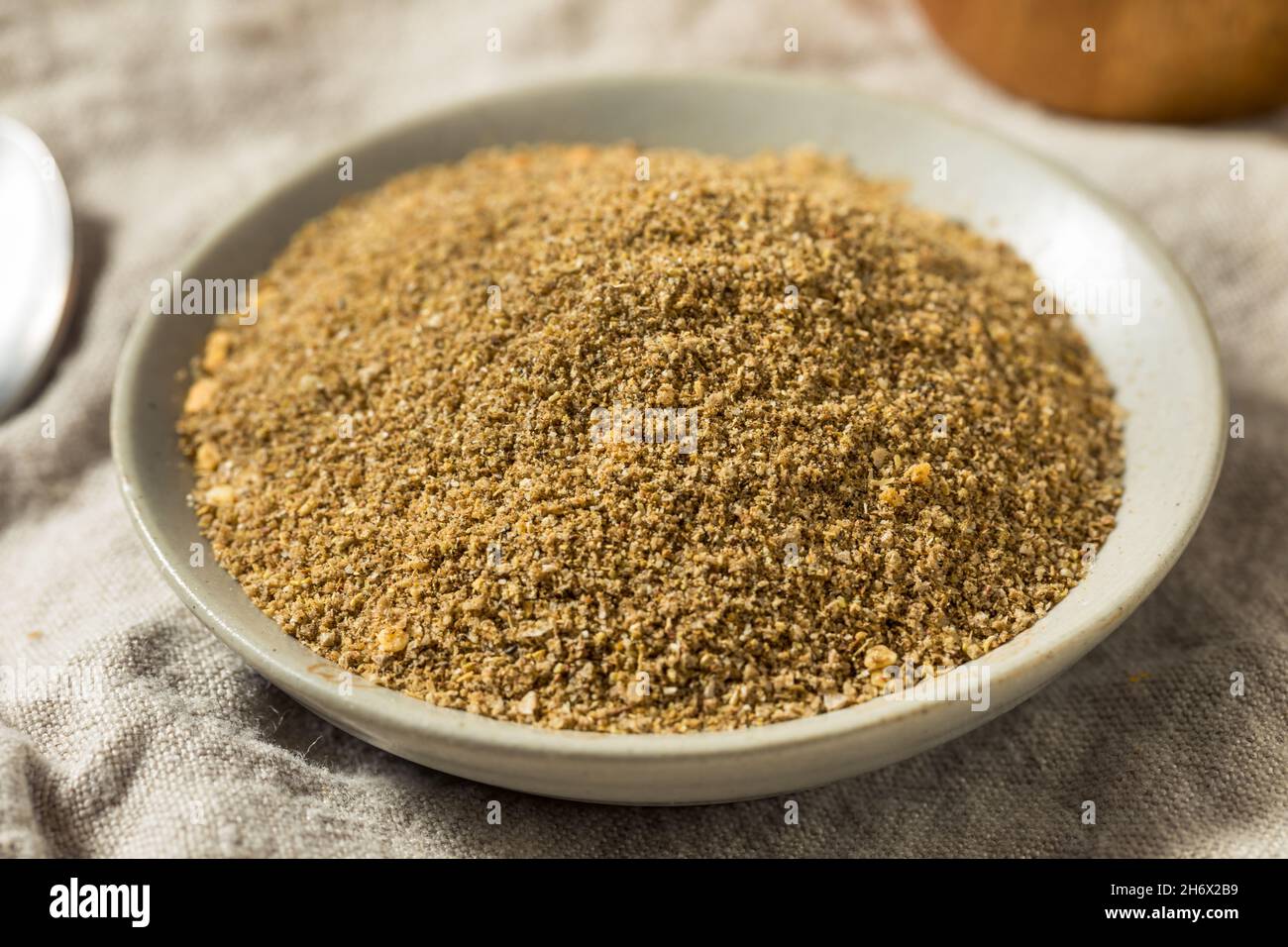 Condimento artigianale delle spezie asiatiche in una ciotola Foto Stock