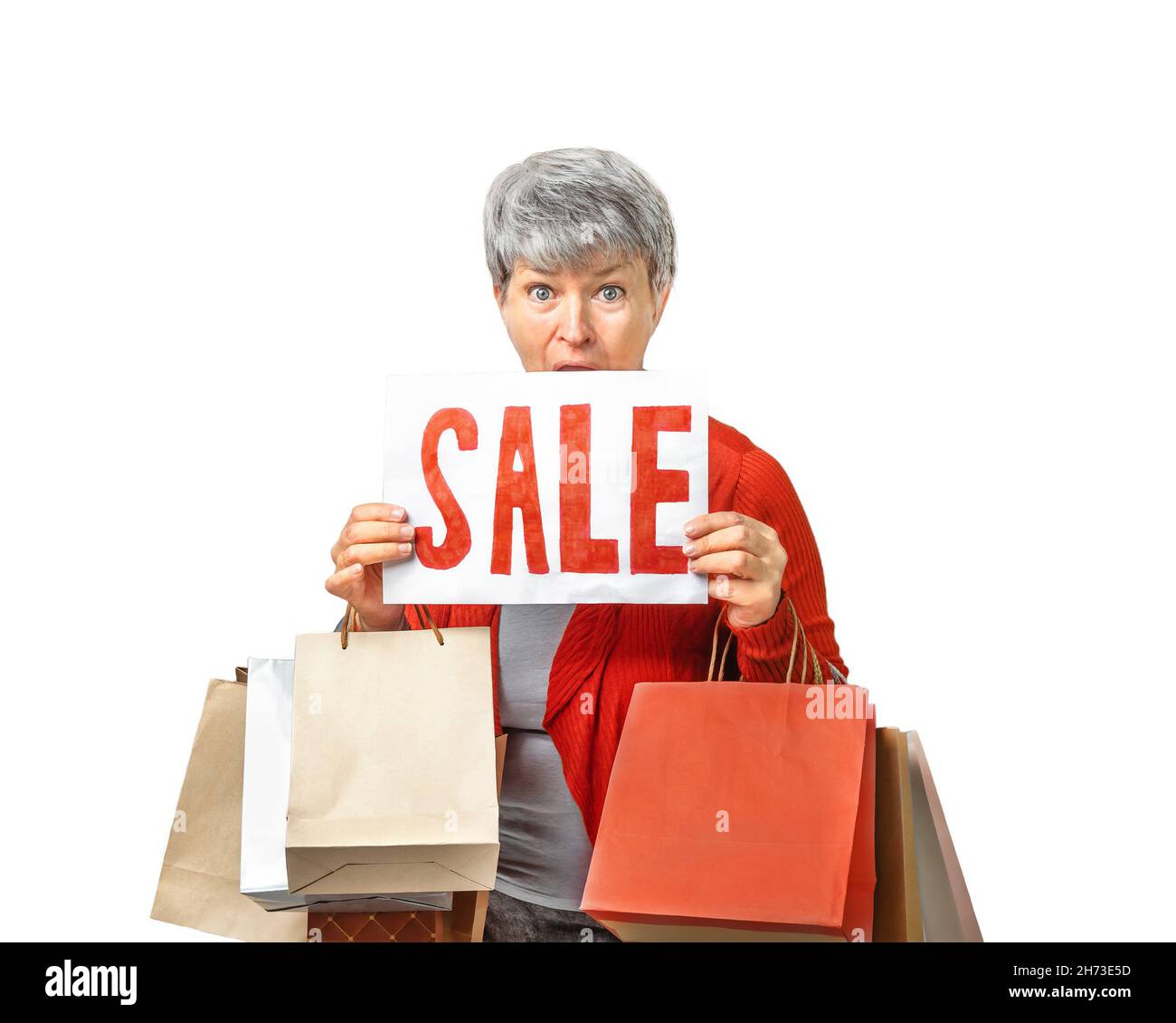 Senora donna con borse e VENDITA segno isolato su sfondo bianco Foto Stock