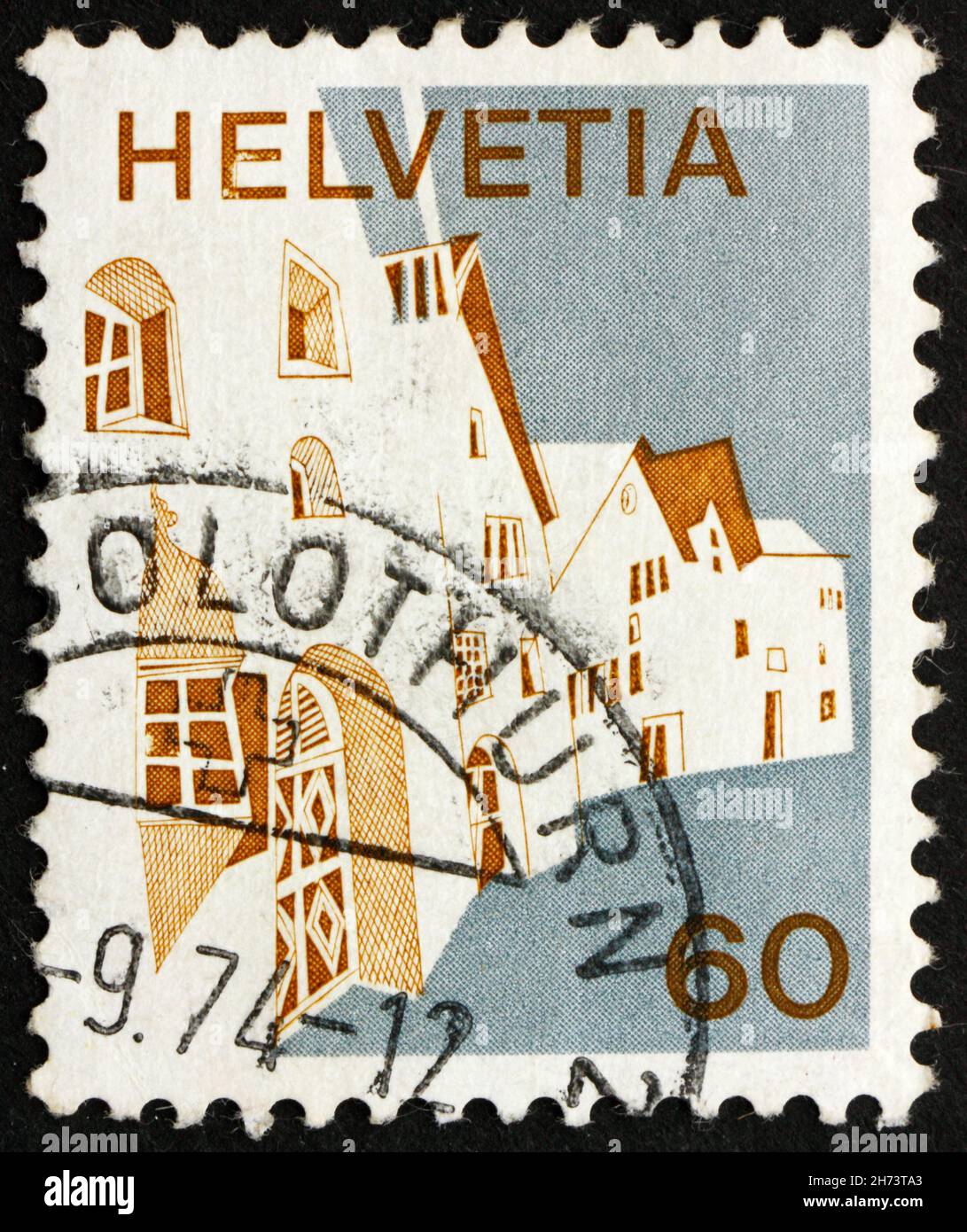 SVIZZERA - CIRCA 1973: Un francobollo stampato in Svizzera mostra Village in Engadina, Svizzera, circa 1973 Foto Stock