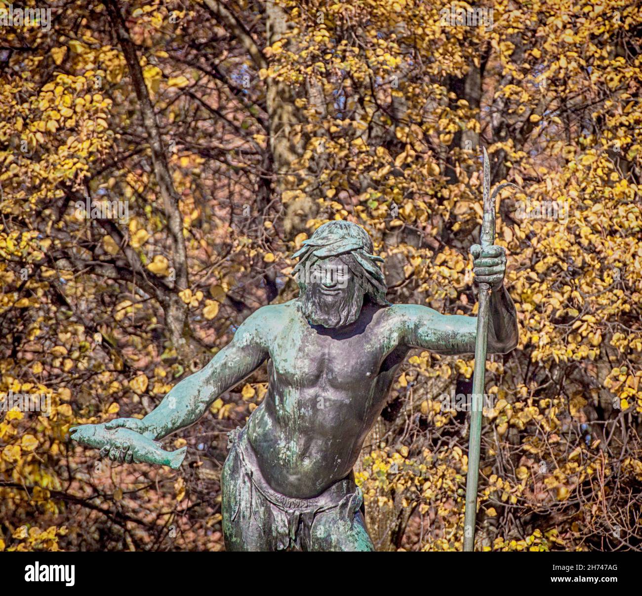 Monaco, la statua neobarocca in bronzo di Padre Reno (Vater-Rhein) con un pesce in mano, terminata nel 1903 e collocata nel 1932 sull'isola dei musei di Foto Stock