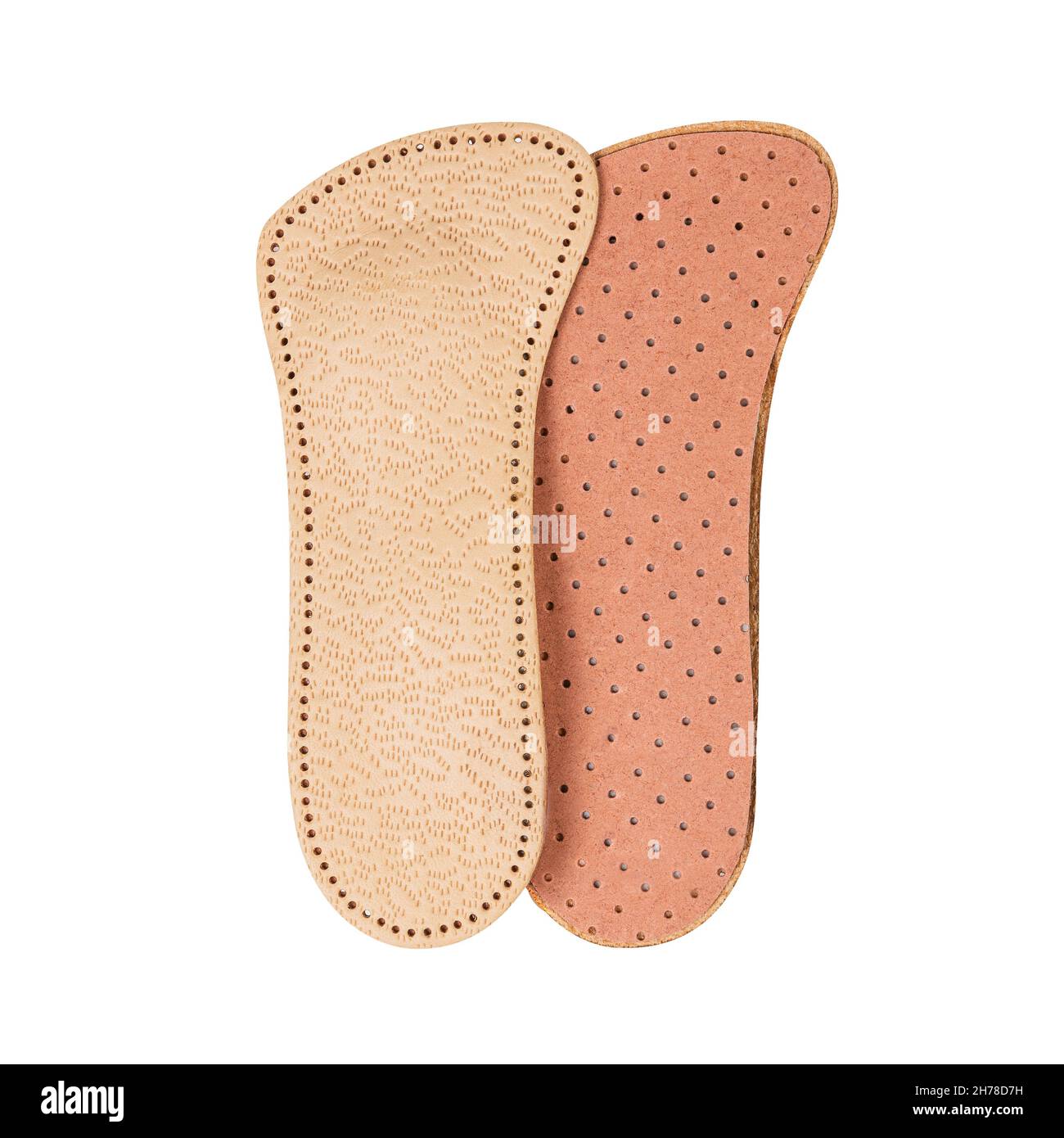 Solette in pelle ortopedica isolate su sfondo bianco. Solette per una camminata sana. Foto Stock