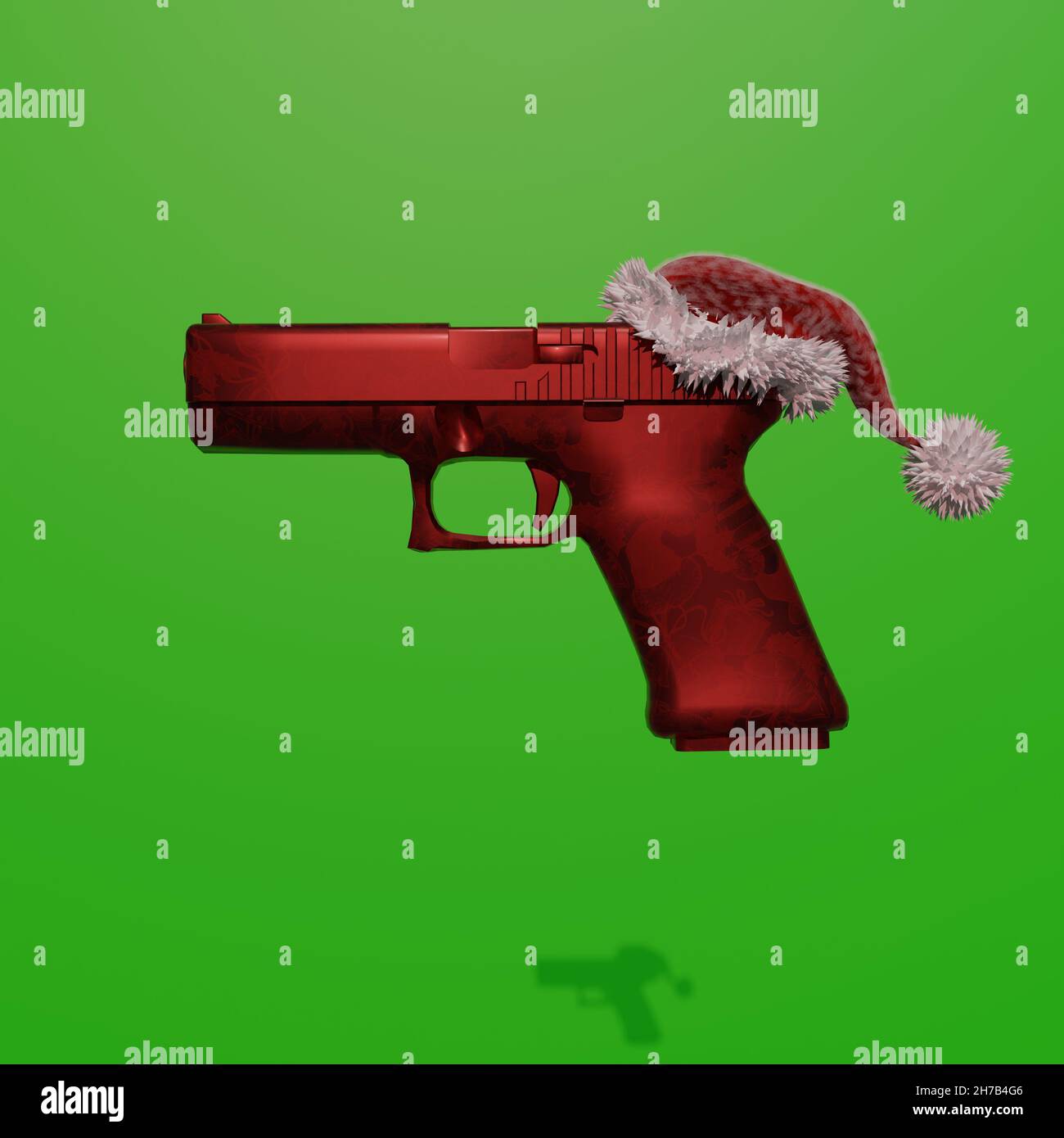 Arma da fuoco con una mano a tema natalizio e un cappellino di Natale su sfondo verde Foto Stock