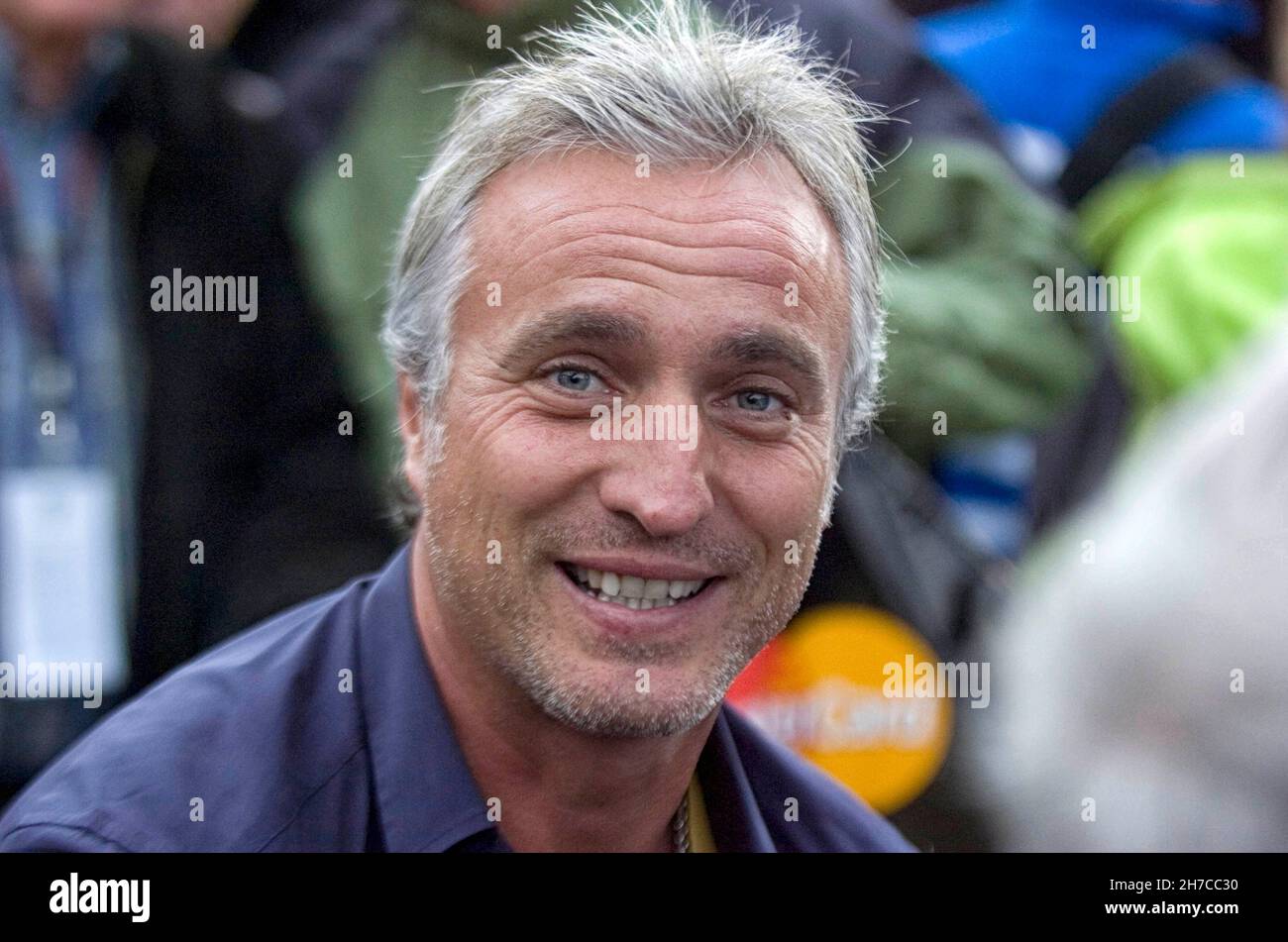 L'ex calciatore francese David Ginola partecipa alla Ryder Cup al Celtic Manor di Newport, Regno Unito, nel 2010. Foto Stock
