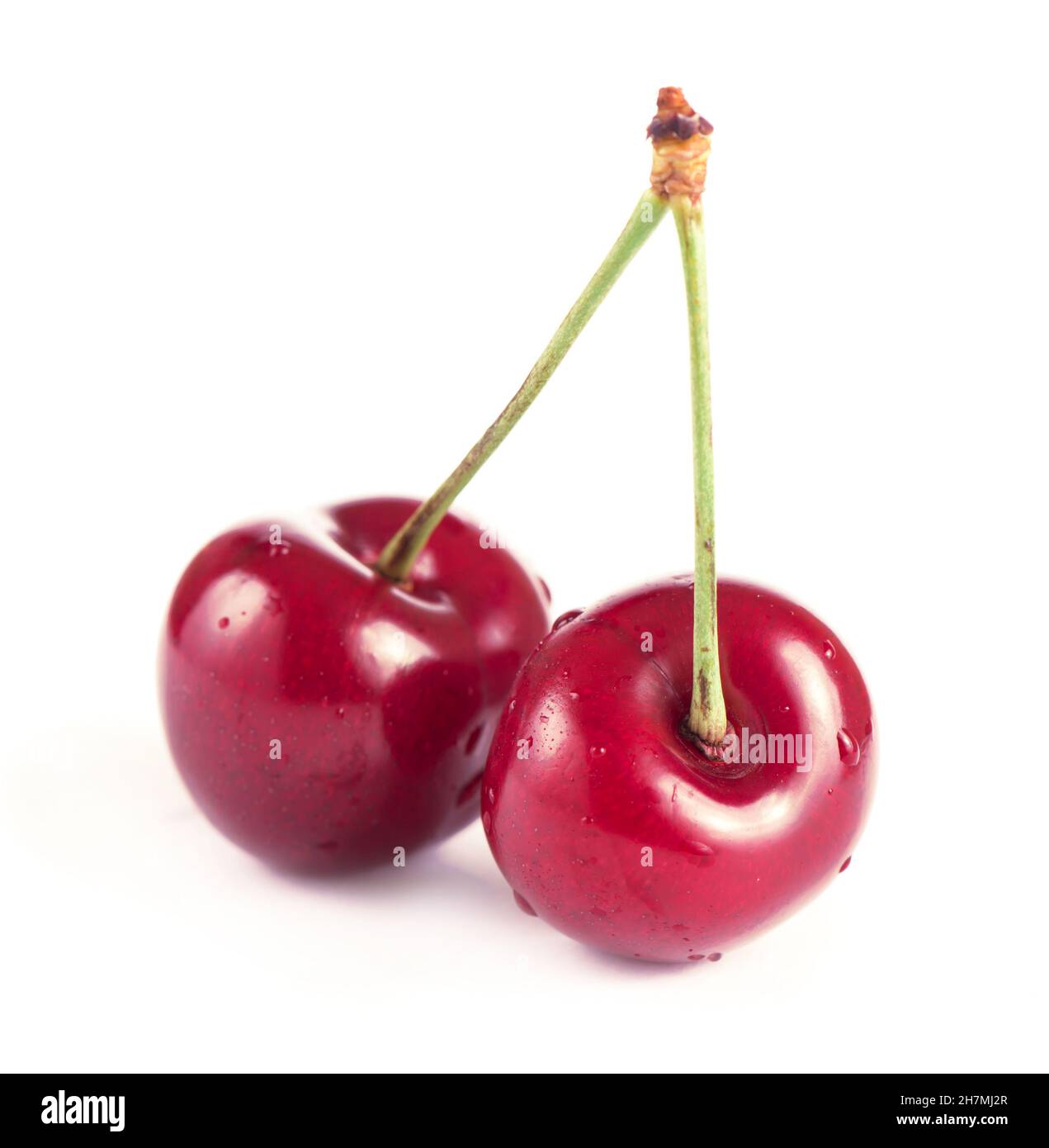 Vino e pomodori con basilico in ambiente vintage su tavola di legno Foto Stock