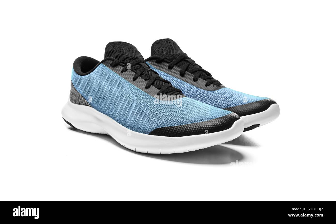 Scarpe sportive isolati su sfondo bianco Foto Stock