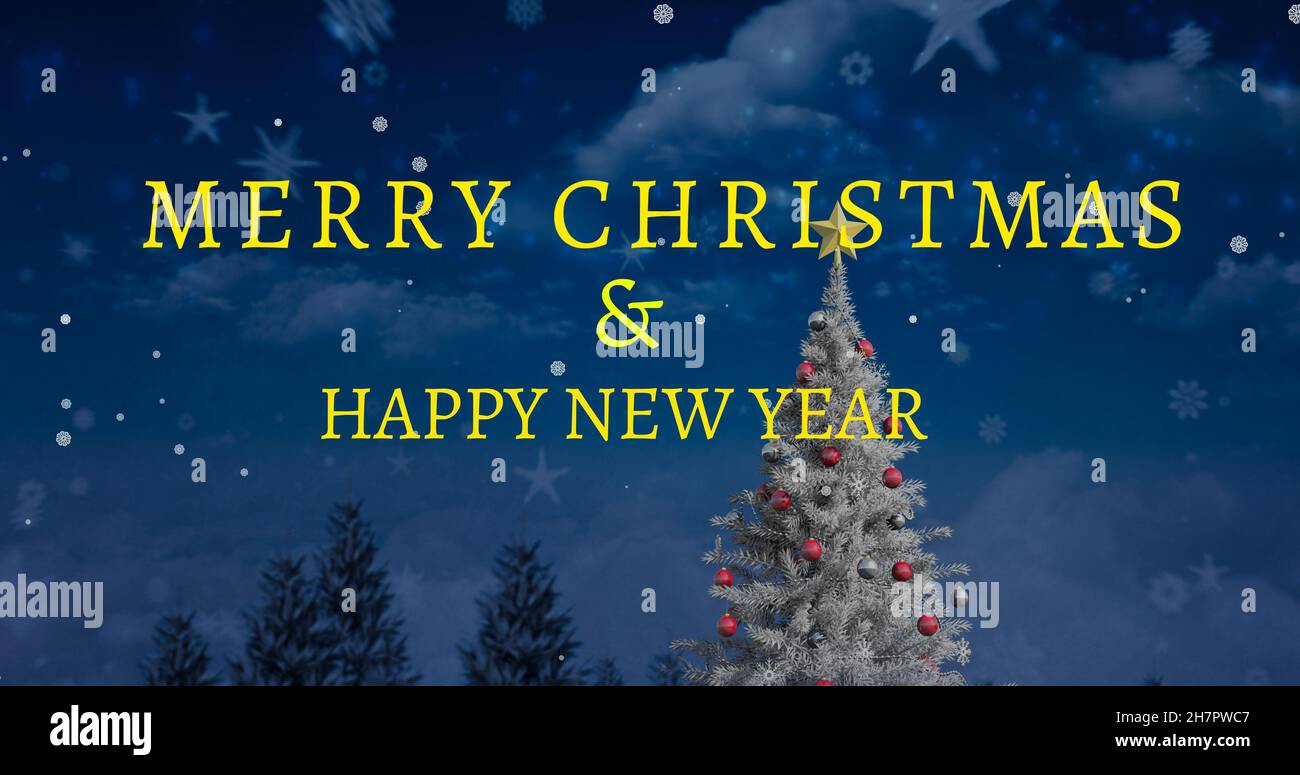 Buon natale e nuovo anno desidera testo su albero decorato contro il cielo con fiocchi di neve e stelle Foto Stock