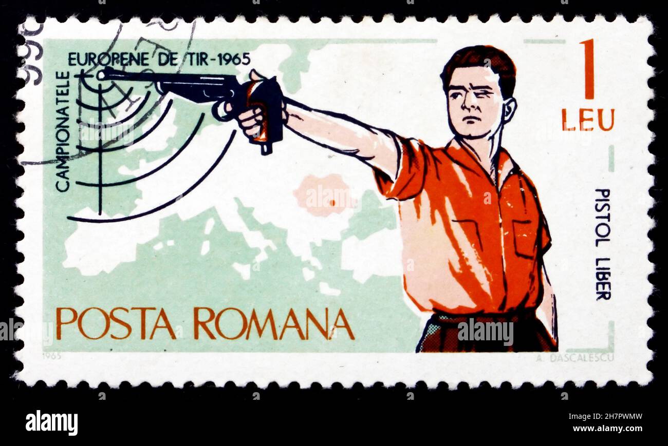 ROMANIA - CIRCA 1965: Un francobollo stampato in Romania mostra Free Pistol and Map of Europe, European Shooting Championships, Bucarest, circa 1965 Foto Stock