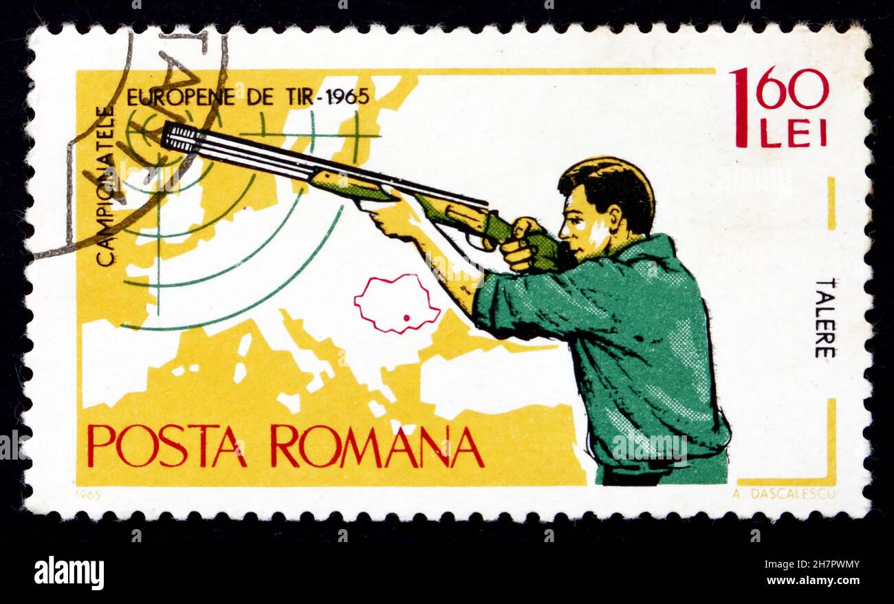 ROMANIA - CIRCA 1965: Un francobollo stampato in Romania mostra Small-Bore Rifle, Standing, and Map of Europe, European Shooting Championships, Bucarest, Foto Stock