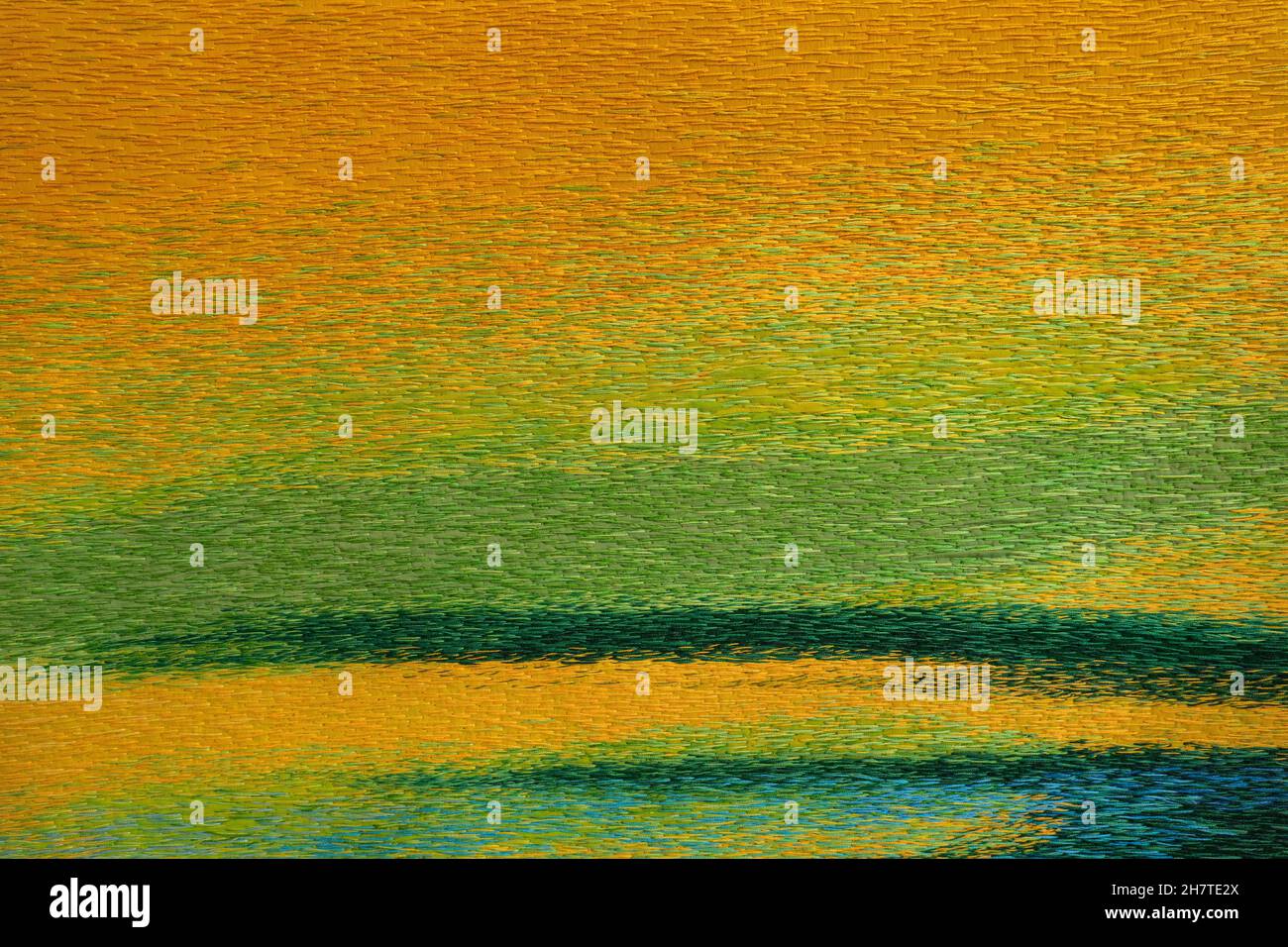 Tessuto colorato con fili di lana grossolani ricamati in primo piano Foto Stock