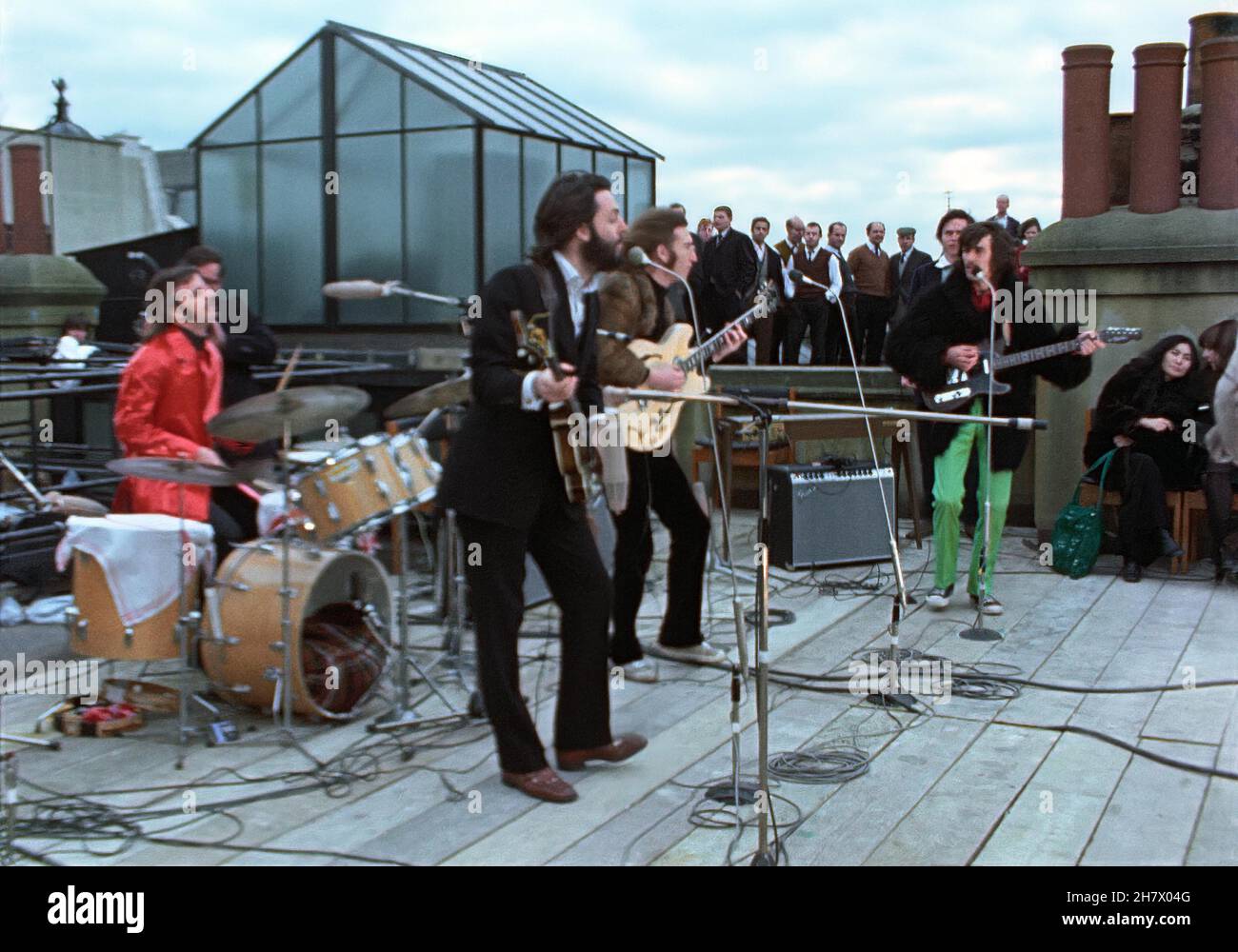 Concerto sul tetto dei Beatles. John Lennon, Paul McCartney, George Harrison e Ringo Starr Foto Stock