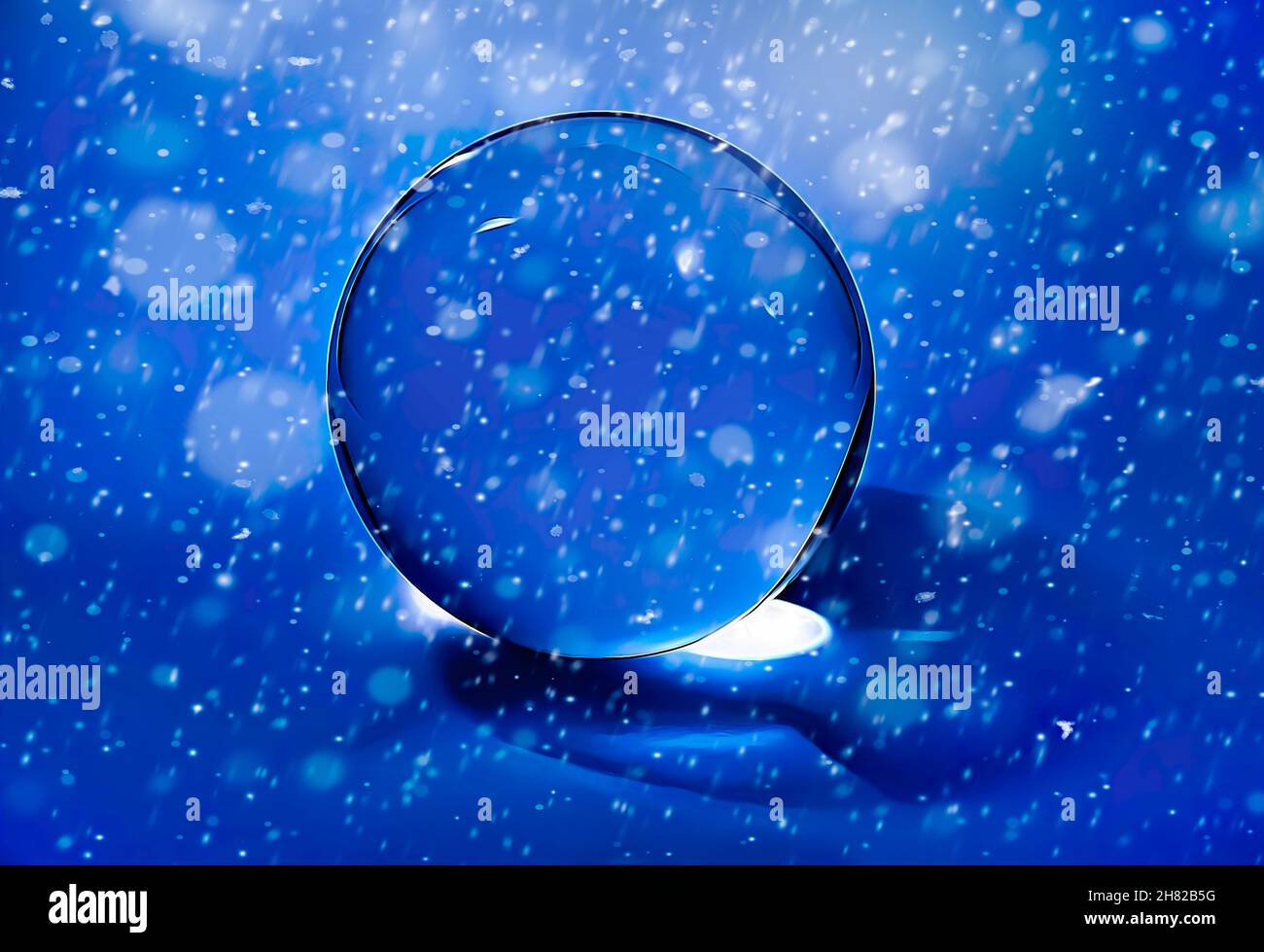 Nevicando in una sfera di cristallo Foto Stock