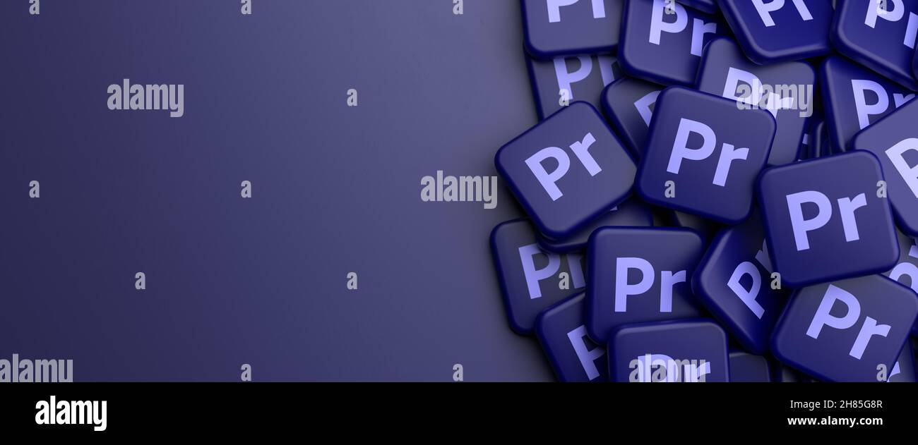 Logo del programma software di editing video Adobe Premiere Pro - parte principale della Creative Cloud Apps Suite su un heap su un tavolo. Spazio di copia. Divieto del Web Foto Stock
