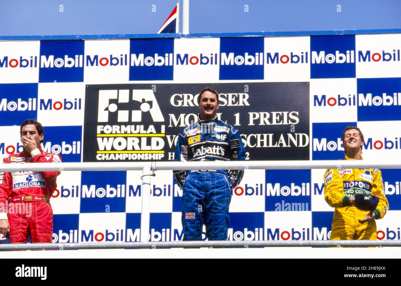 01 Senna Ayrton (bra), Honda Marlboro McLaren, McLaren-Honda MP4/7A, 05 Mansell Nigel (gbr), Canon Williams Team, Williams Renault FW14B, 19 Schumacher Michael (ger), Camel Benetton Ford, Benetton-Ford B192 sul podio durante il Gran Premio di Germania 1992 sull'Hockenheimring, 10° round del Campionato FIA di Formula 1 1992 dal 24 al 26 luglio 1992 a Hockenheim, Germania - Foto: DPPI F1/DPPI/LiveMedia Foto Stock