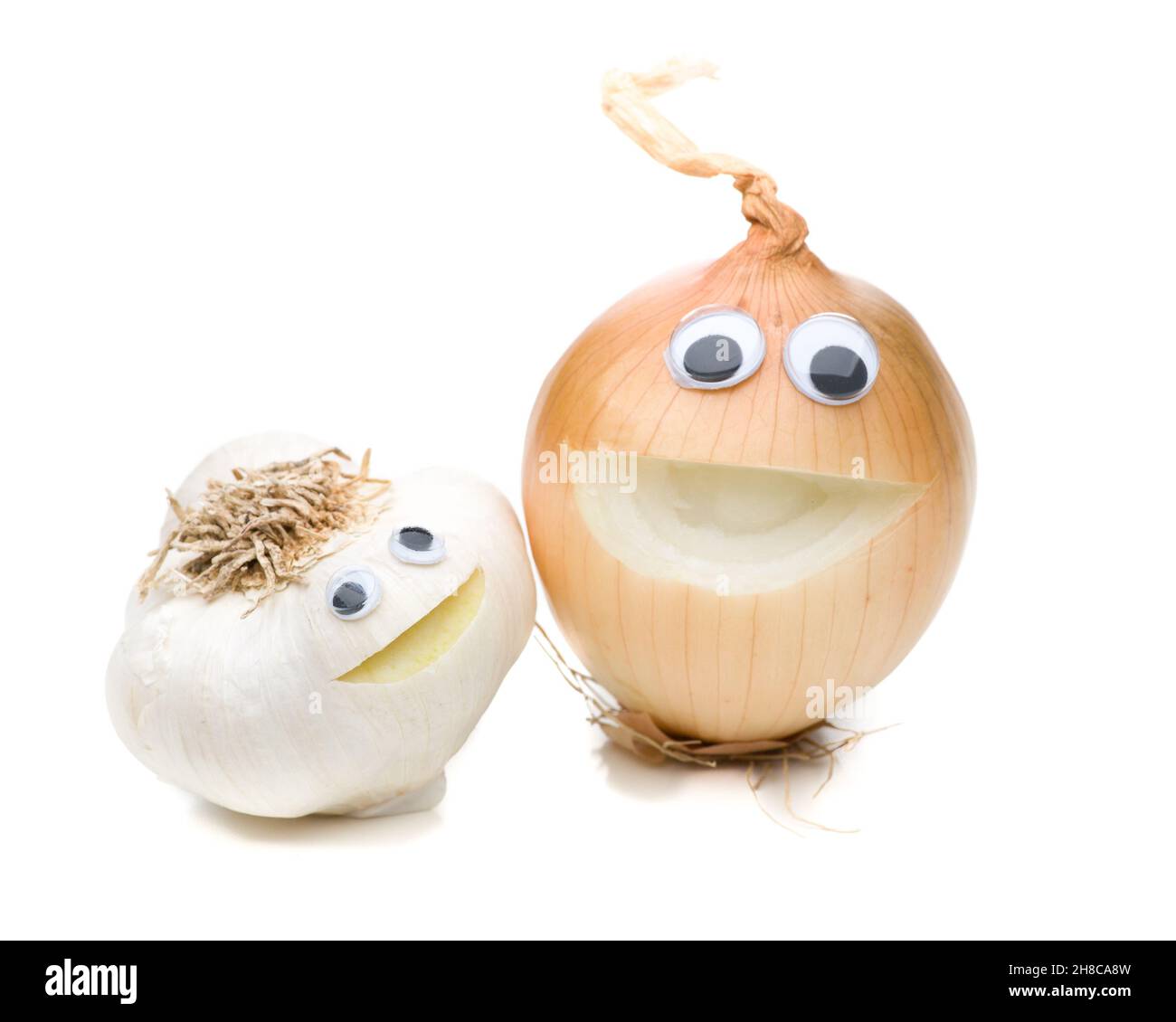 Ridendo un paio di aglio e cipolla Foto Stock