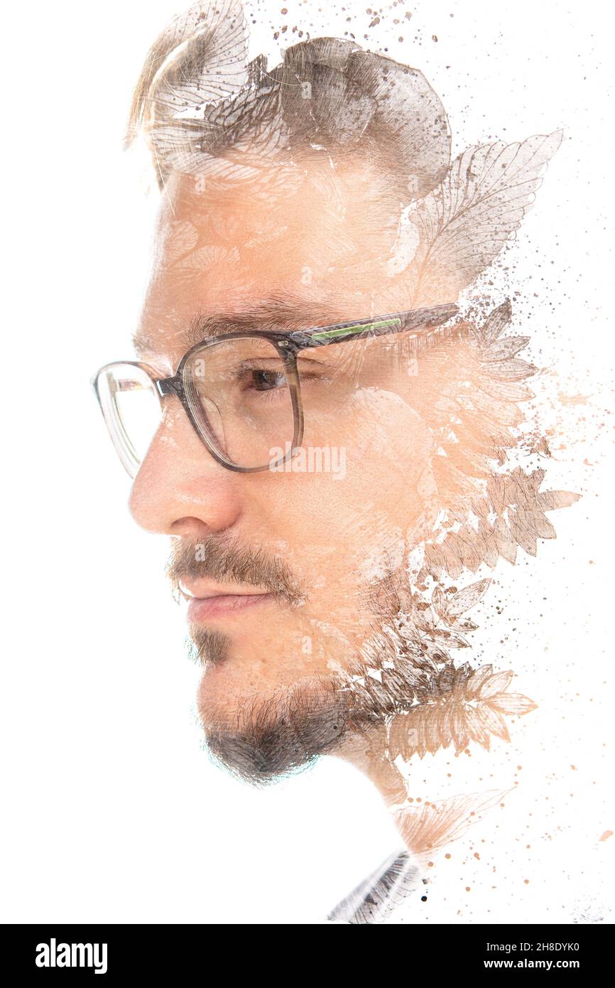 Pittura. Pittura delle foglie e ritratto di un giovane Foto Stock