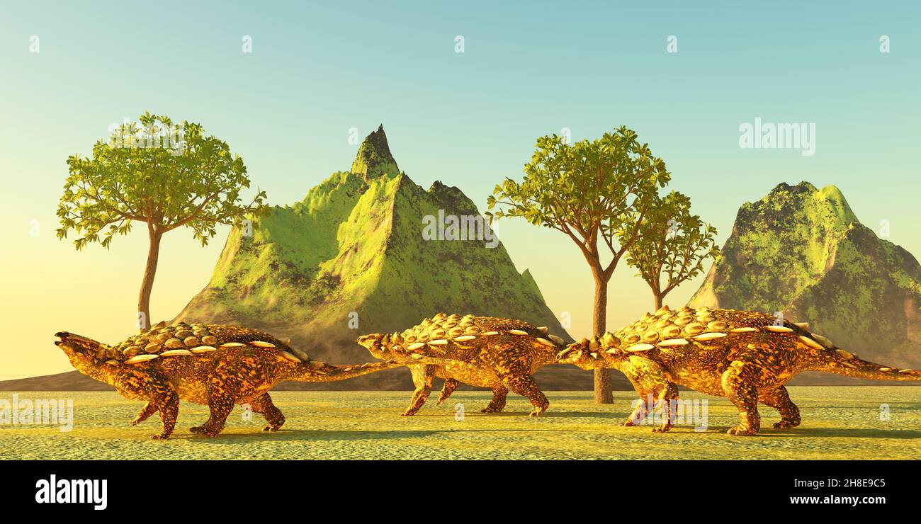 Tre erbivori corazzati Gargoyleosaurus ankylosaurs viaggiano insieme durante le epoche preistoriche del Nord America. Foto Stock