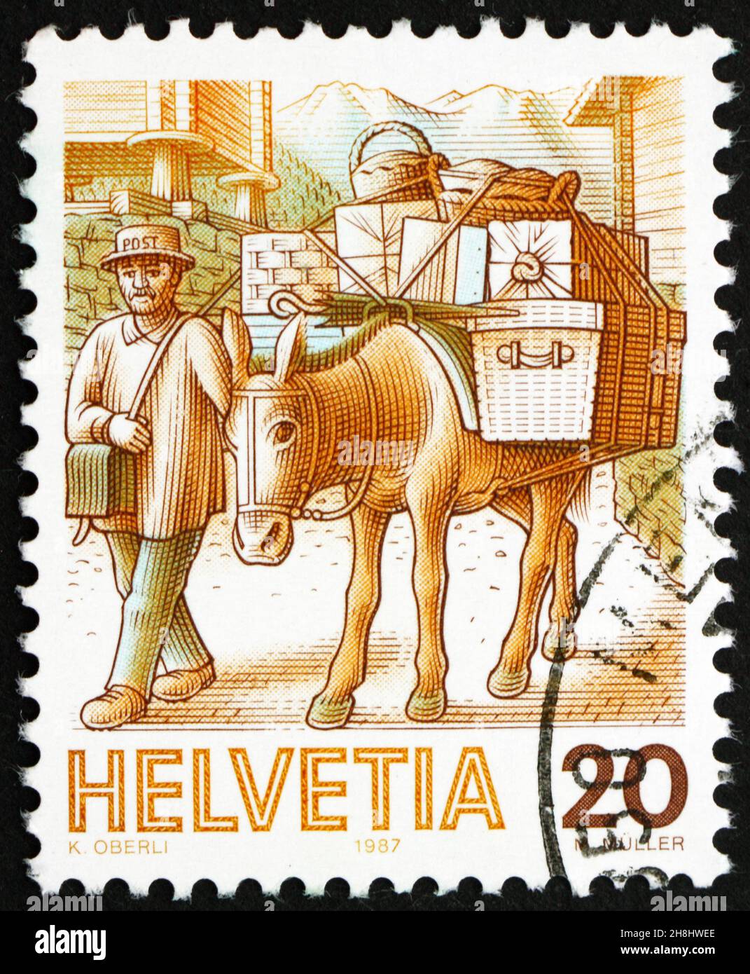 SVIZZERA - CIRCA 1987: Un francobollo stampato in Svizzera mostra Mule Post, Mail Handling, circa 1987 Foto Stock