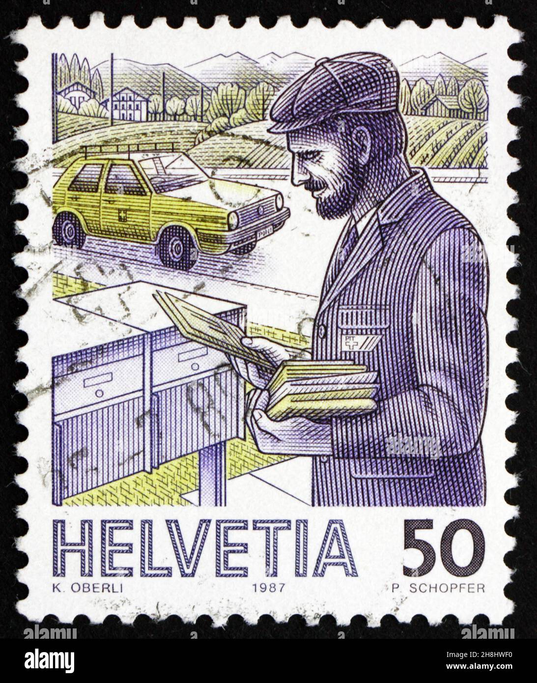 SVIZZERA - CIRCA 1987: Un francobollo stampato in Svizzera mostra Postman, 1986, Mail Handling, circa 1987 Foto Stock