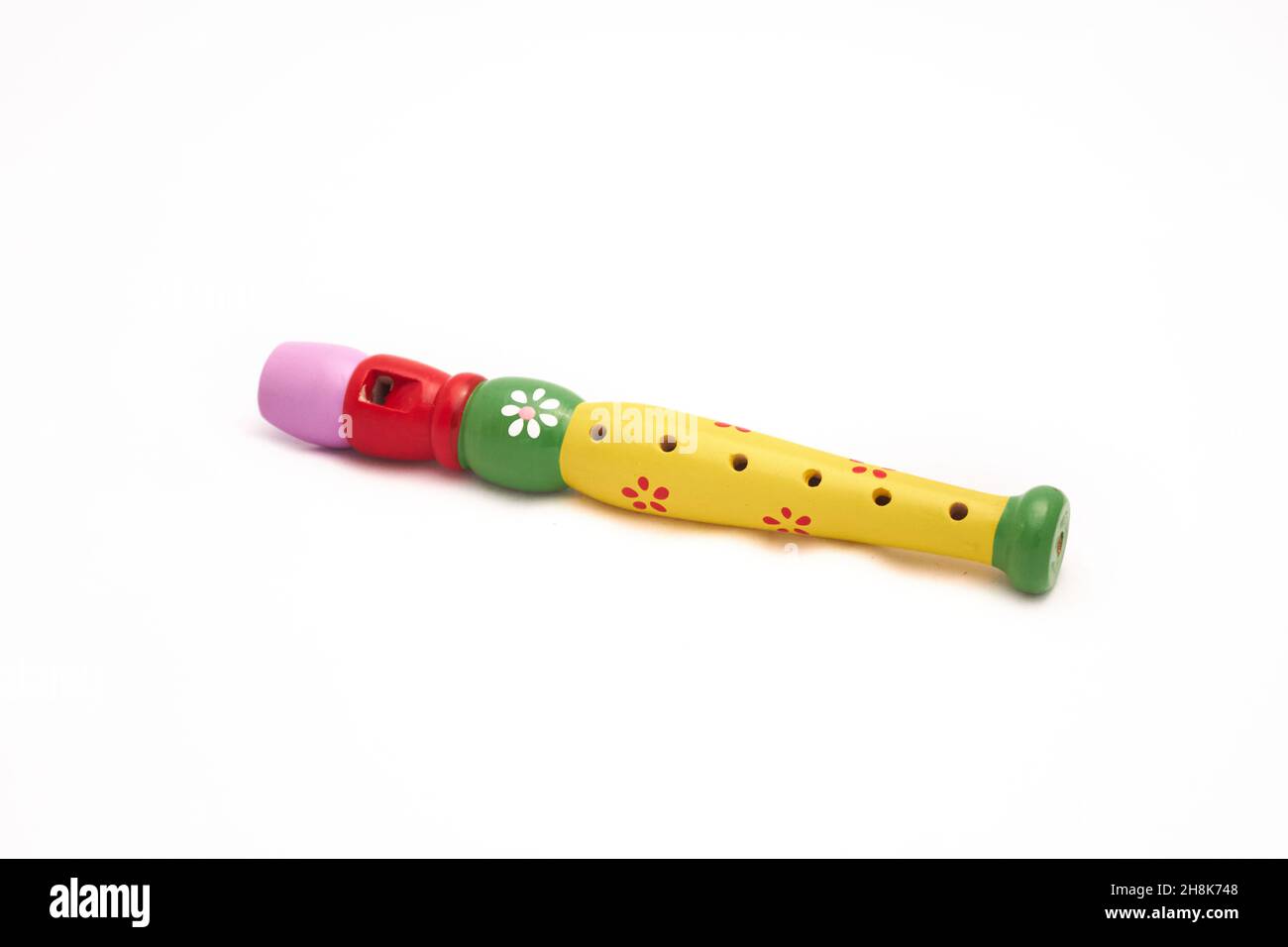 flauto in legno per bambini. intelligenza musicale montessori. Foto Stock