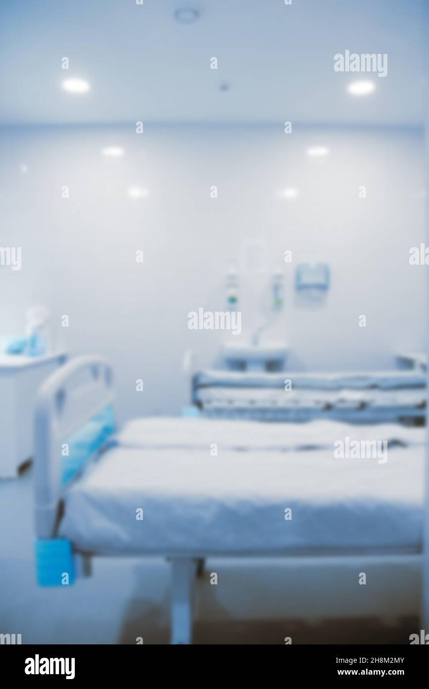 Sala operatoria interna vuota e apparecchiature moderne in ospedale.dispositivo medico per il chirurgo chirurgico di emergenza paziente in blu stile.Salva Foto Stock