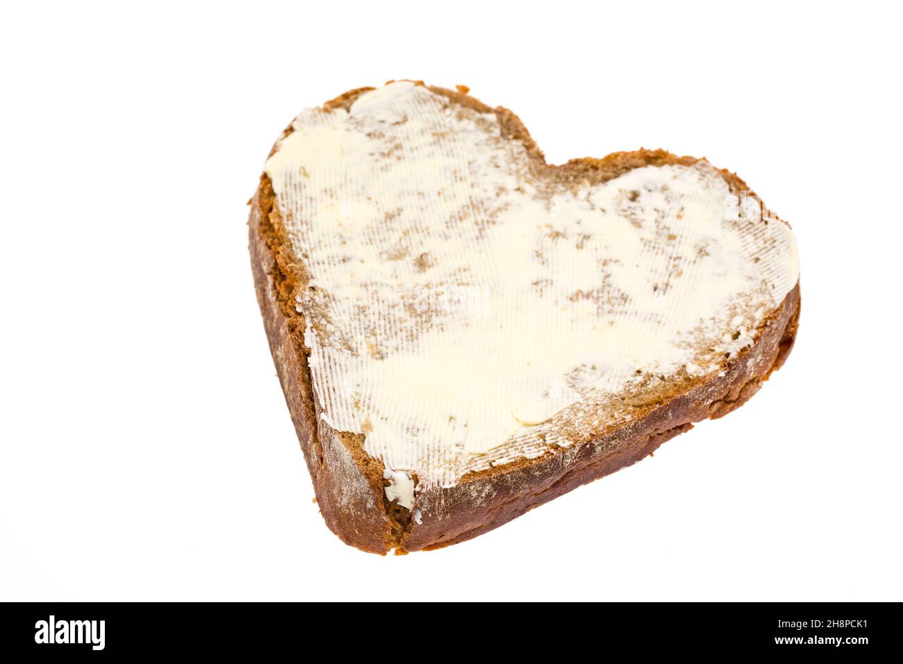 Pane e burro a forma di cuore pane, burro pane, cuore, amore, giorno della madre, burro, san valentino, colazione, marmellata Foto Stock