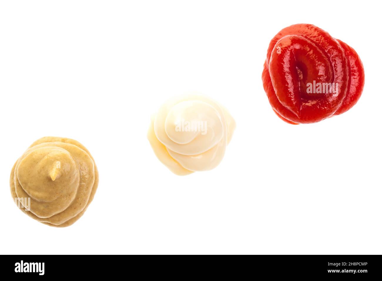 Ketchup, maionese e senape dalla vista dell'uccello ketchup, senape, maionese, salse, giallo, rosso, bianco, insieme, salsa cremosa Foto Stock