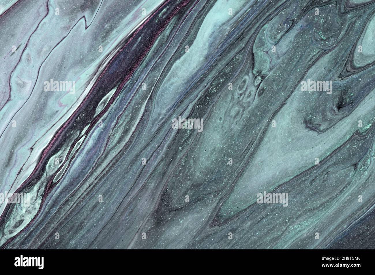 Astratto fluido arte sfondo grigio e argento colori. Marmo liquido. Pittura acrilica con gradiente e spruzzi. Sfondo acquerello con motivo ondulato. Foto Stock
