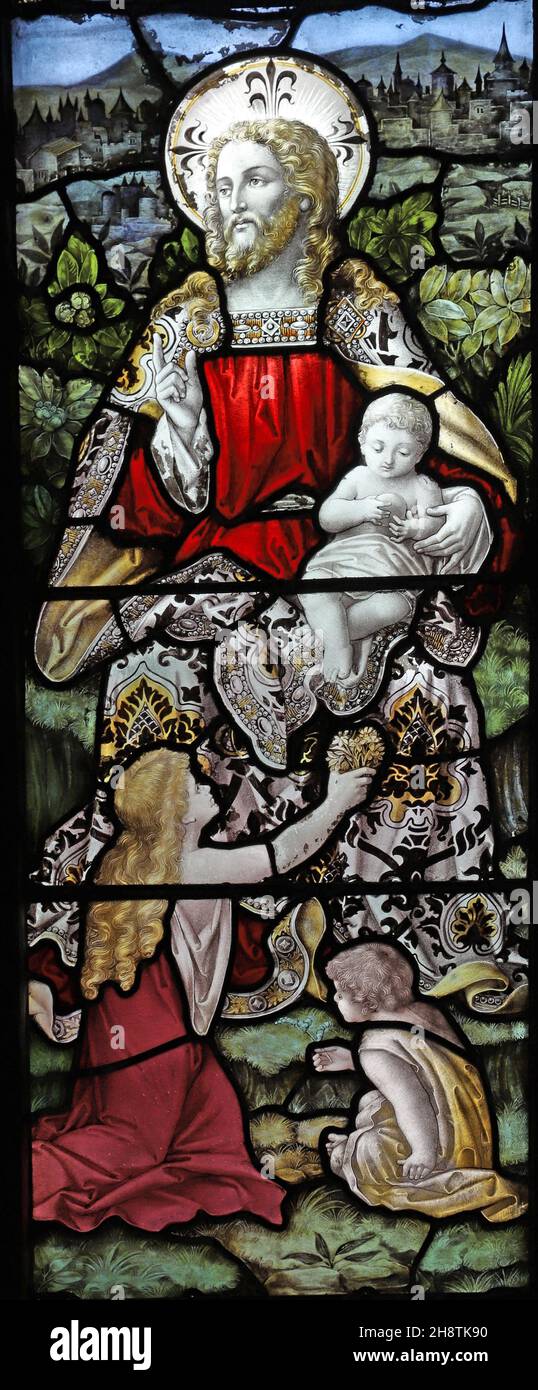 Vetrata del 1892 di Percy Bacon & Brothers raffigurante Gesù con i bambini, Chiesa di San Michele e tutti gli Angeli, Mickleham, Surrey Foto Stock